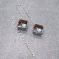 Magnificent blue square drop earrings with sterling silver tail designed by a minimalist artist
