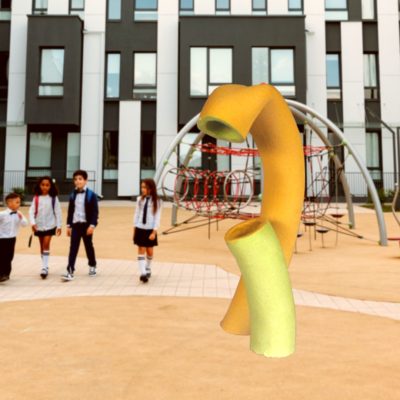 Yellow and green sculptures at a playground